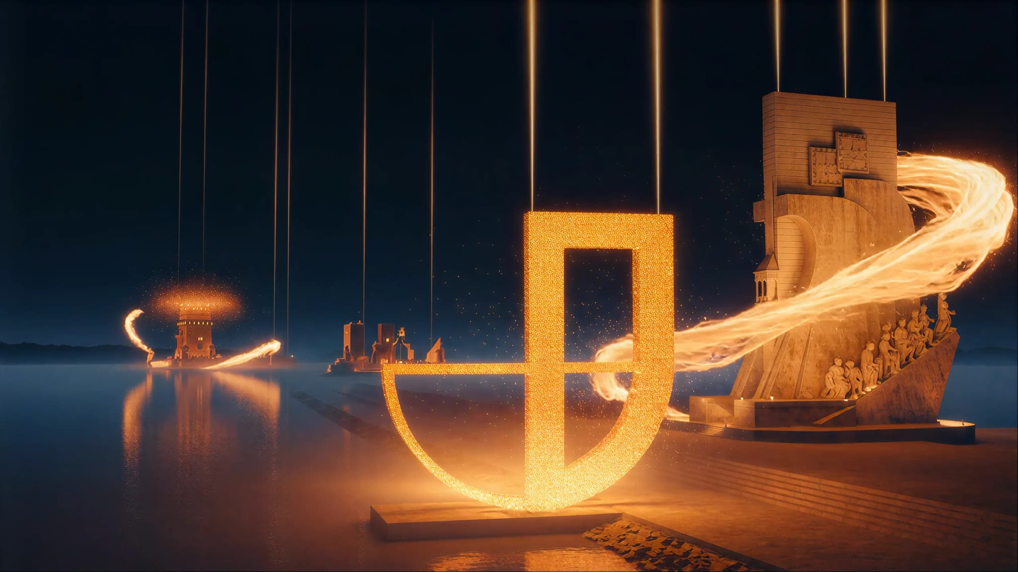 Quadro do filme: a letra J do POBJ vira um monumento dourado ao lado do Padrão dos Descobrimentos, em Lisboa, à noite.